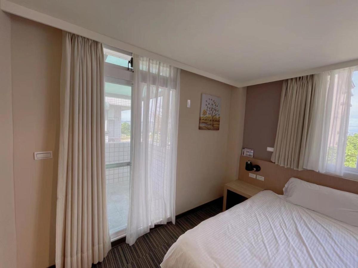 Breeze And Waves Hostel Jinning Εξωτερικό φωτογραφία
